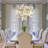 7-Light 23.6'' Dimmable Modern Gold Tree Branch Chandelier with Ceramic Ginkgo Leaf