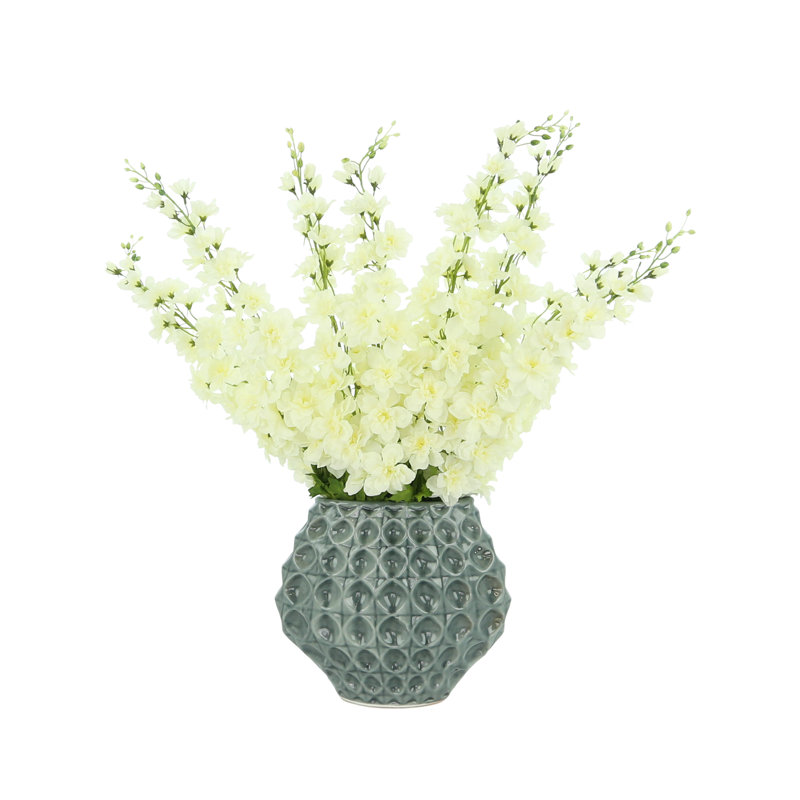Delphinium Floral Arrangement In A Ceramic Vase