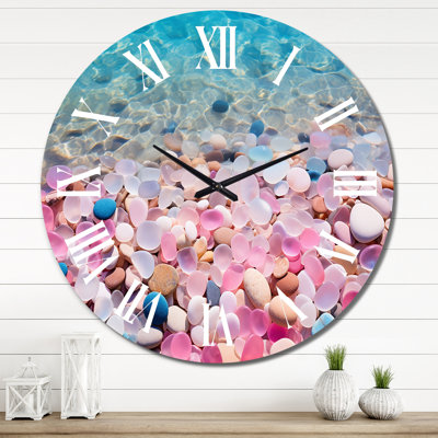 Pink Pebbels On Blue Azure Beach Wall Clock
