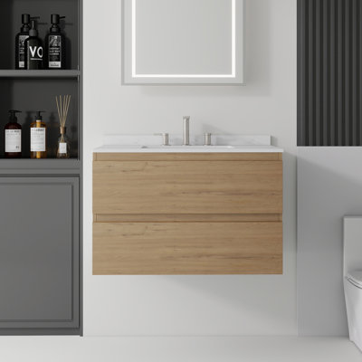 Meuble-lavabo suspendu de 76 cm avec lavabo en céramique, armoire en contreplaqué, comptoir et dosseret en marbre reconstitué blanc de Carrare, 2 tiroirs à fermeture douce, chêne (robinet non inclus)