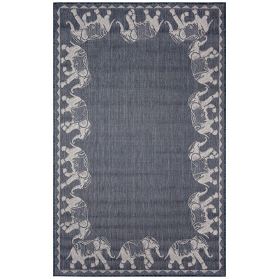 Humberto Marching Elephants Indoor/Outdoor Area Rug
