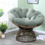 Fauteuil d'appoint ergonomique pivotant en rotin d'acier de style moderne pour le salon