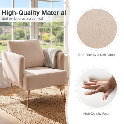 Fauteuil d'appoint moderne avec coussin de dossier, pattes en métal doré, confortable, beige.