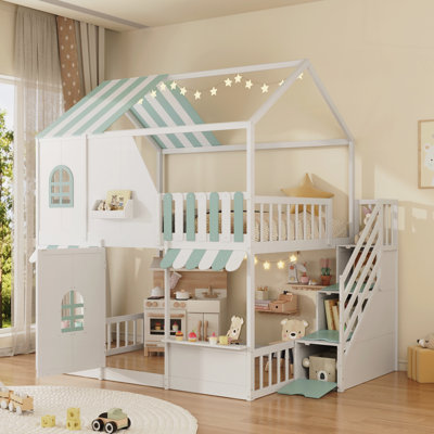 Lit superposé double au dessus d'un lit double avec escalier de rangement, tablettes et conception de maisonnette