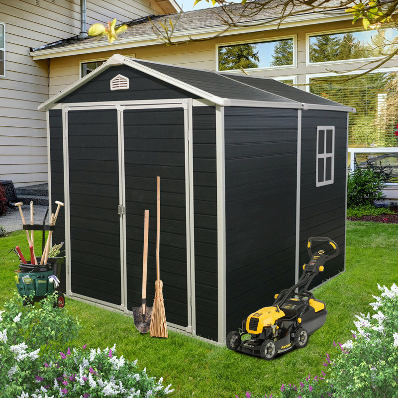 Storage shed with window and air vents