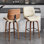 Tabouret de bar pivotant rembourré avec structure en bois massif