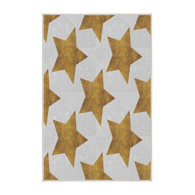 Tapis beige/orange à motifs