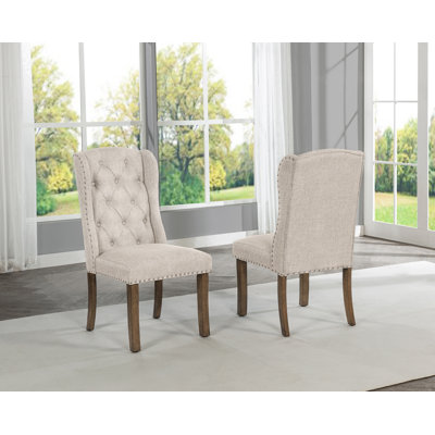 Winged Dining Chairs With Button Tufted Back
