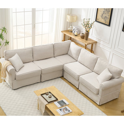 Canapé d'angle convertible 5 places en forme de L, revêtement beige en tissu doux et gain de place, convertible et confortable, revêtu de lin.