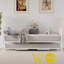 Lit de jour en métal avec couchette escamotable et roulettes verrouillables, structure de canapé-lit peu encombrante avec tête de lit élégante, simple, blanc-398526703