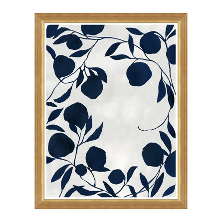 Framed print of navy leaves and fruit on a white background.