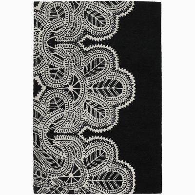 Tapis en cactus floral noir et blanc touffeté à la main Glyndia