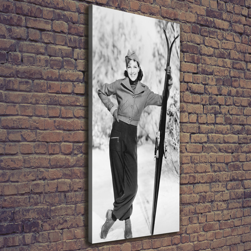 Woman With Skis - Wrapped Canvas Print