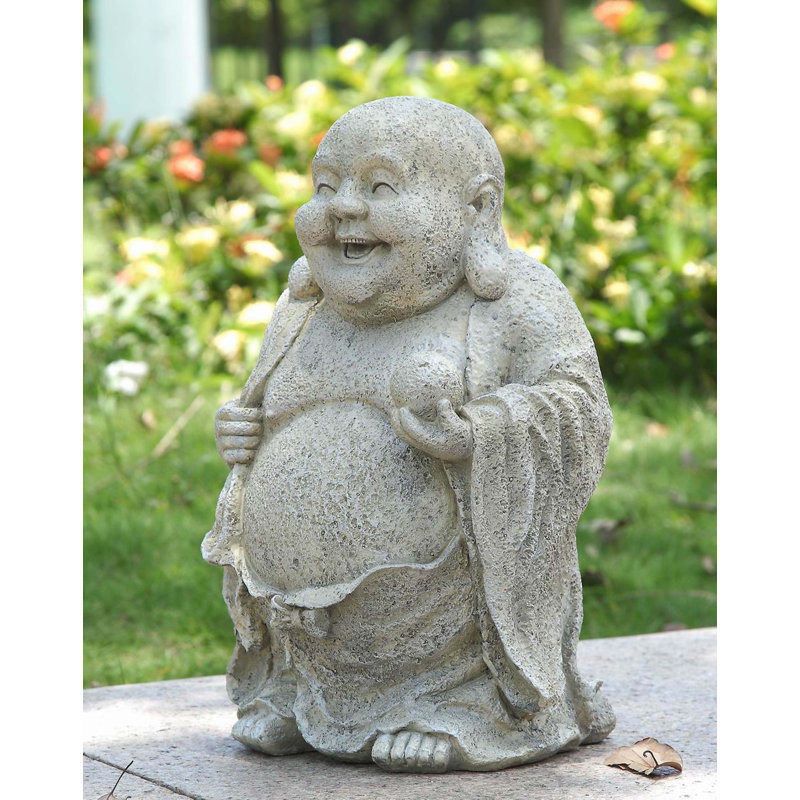 Statue bouddha contenant une boule