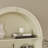 Arc-Shaped Cabinet With Open Shelves