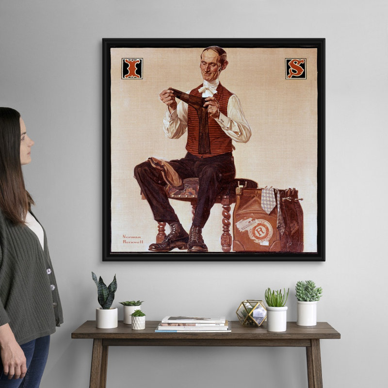 «Man Inspecting Socks», art mural sur toile, Cadre flottant noir, H 38 po x l 38 po x P 1,75 po