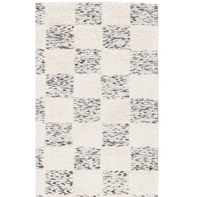 Tapis Natura 710 ivoire / noir