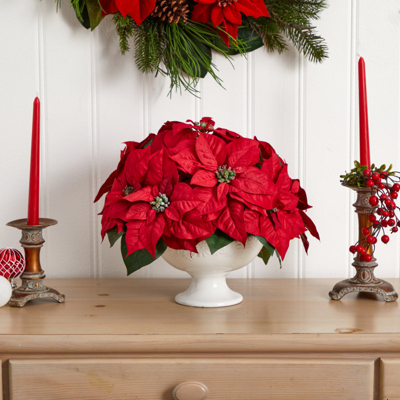 Arrangement floral poinsettia dans un vase