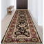 Manchuria Wool Oriental Area Rug in Black/Wine