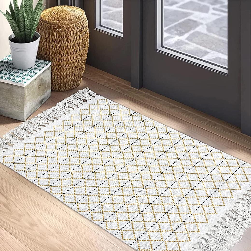 https://assets.wfcdn.com/im/44006670/compr-r85/1611/161146632/villalpando-handmade-flatweave-cotton-yellow-white-rug.jpg