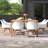 Anautica 8 - Person Eucalyptus Solid Wood Patio Dining Set Umbrella Hole Included Square Table