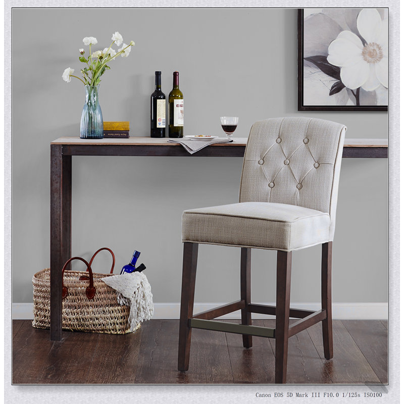 Élégant tabouret de comptoir capitonné avec support dorsal confortable et fabrication durable pour les cuisines et les bars modernes