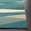 Tapis crème / vert foncé / bleu sarcelle touffeté à la main Ayeln-745738020