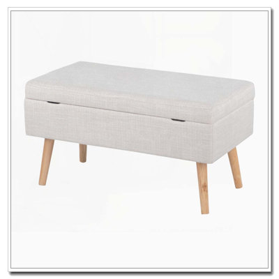 Banc de rangement contemporain avec pieds en bois naturel et tissu beige