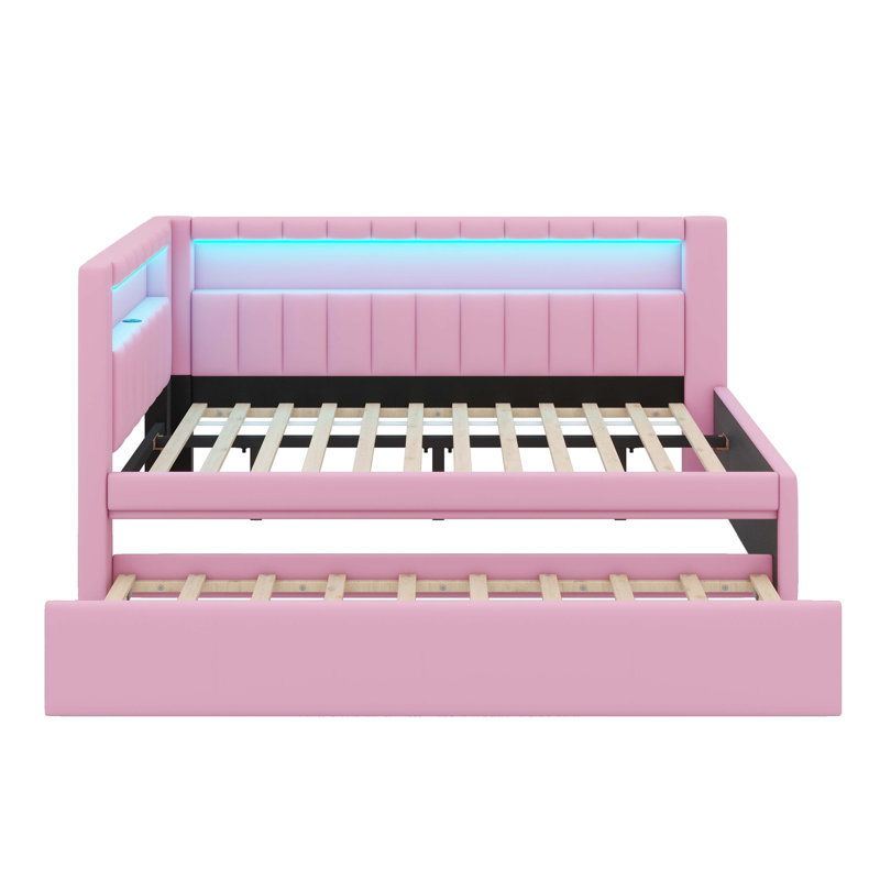 Entirely Upholstered Platform Bed Boasting USB Ports, LED Lighting, And A Trundle, Pink