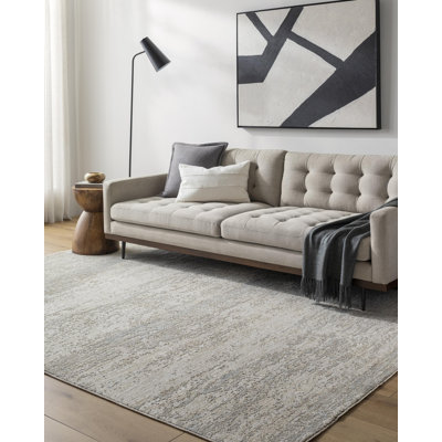 Tapis crème en polyester tissé à la machine Versia