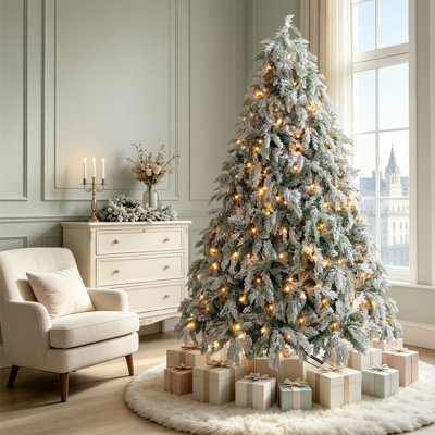 Sapin de Noël artificiel de 1,80 m, pré-illuminé et recouvert de neige floquée, avec lumières DEL blanc chaud, branches denses et réalistes, aspect hivernal naturel pour la décoration intérieure de Noël.
