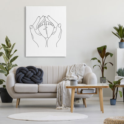 Mains tenant des pieds de bébé - Impression sur toile