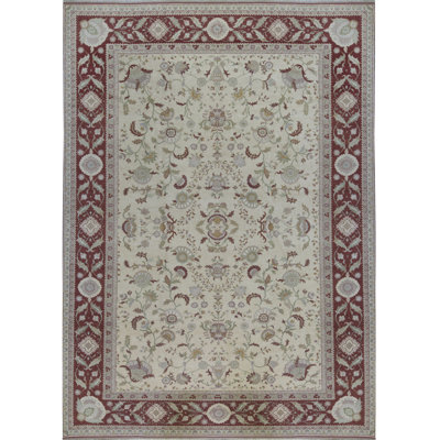 Tapis beige et rouge noué à la main de haute qualité