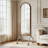 Arched Full Length Mirror with Storage Shelves and Rolling Wheels