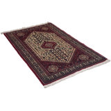 Paisleyann Oriental Area Rug in Beige