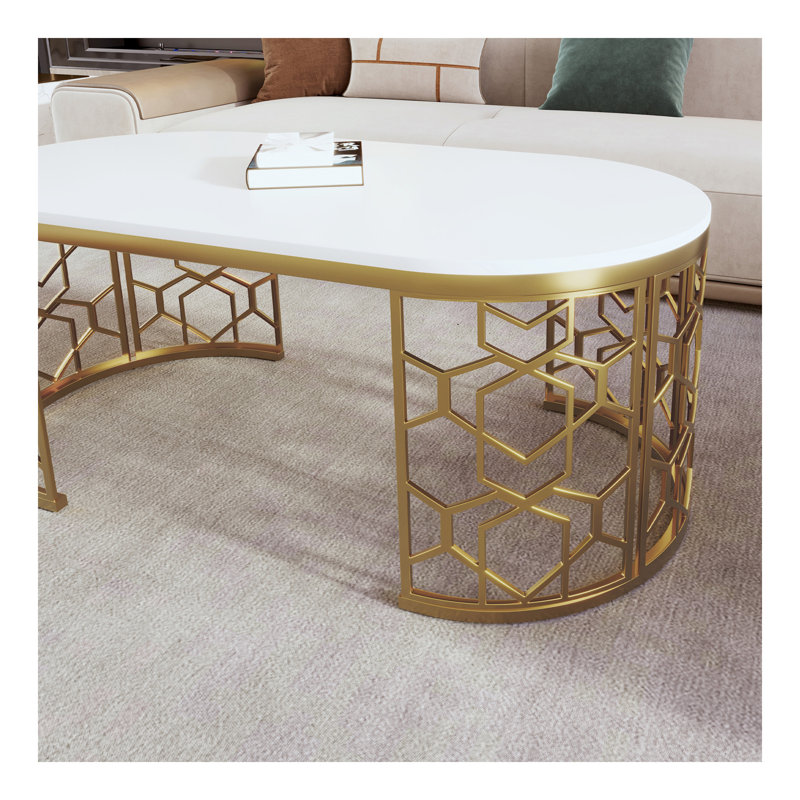 Table basse moderne ovale avec structure en acier inoxydable