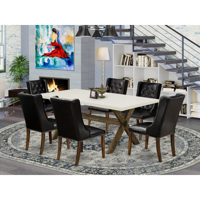 Ensemble de salle à manger 7 pièces composé d'une table de salle à manger rectangulaire avec pieds en X et 6 chaises Parson rembourrées en similicuir noir patiné