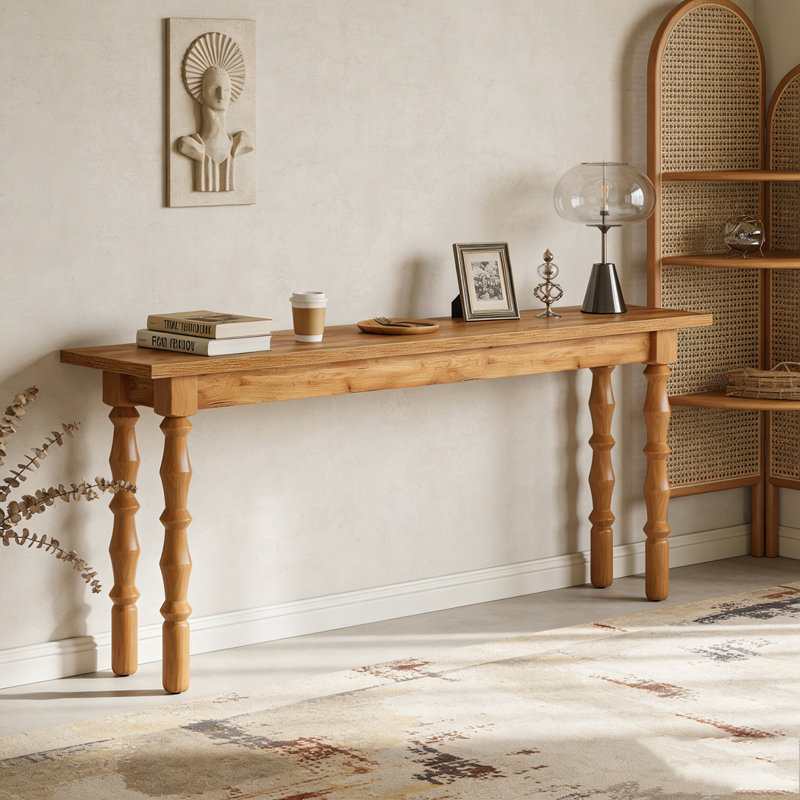 Console en bois avec canapé et table derrière le canapé