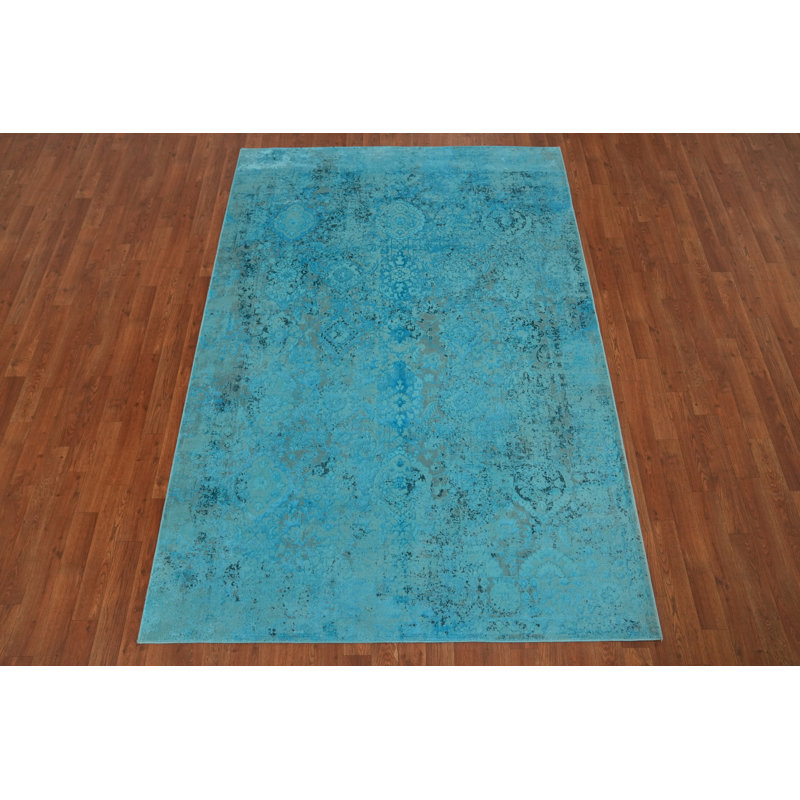 Élégant tapis bleu délavé pour une ambiance tranquille 5 x 7