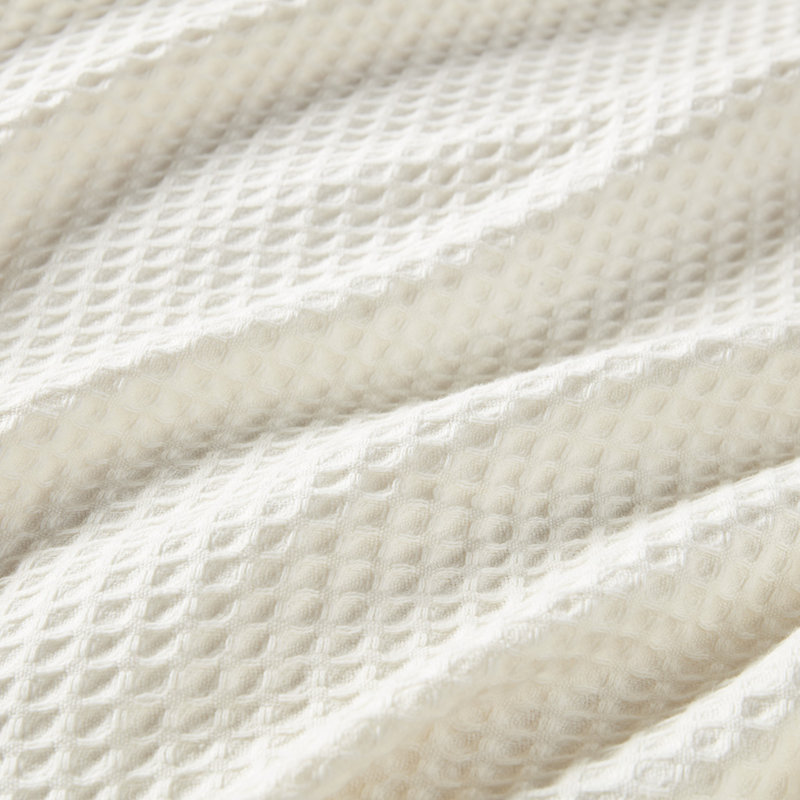 Couverture respirante en coton gaufré pour un confort douillet toute l'année