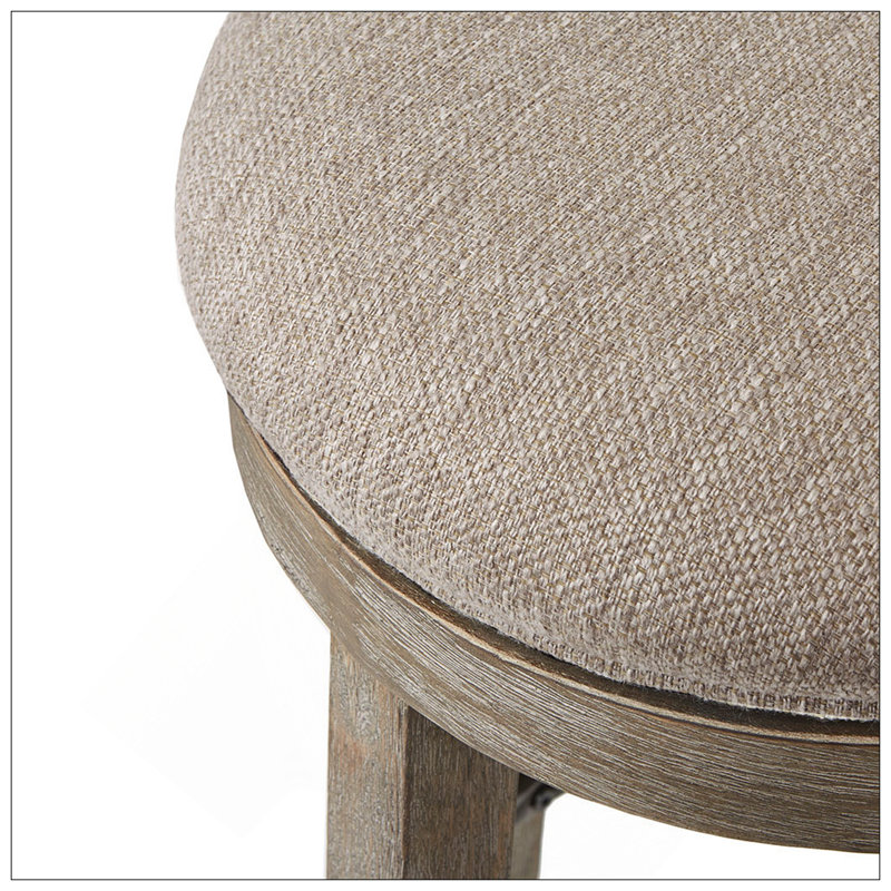 Tabouret de comptoir pivotant avec revêtement gris texturé et structure légèrement patinée pour les cuisines de style campagne urbaine