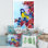 Bouvreuil lumineux assis sur une branche II - impression sur toile