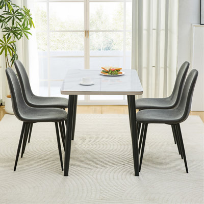 Table and Chair Set.Modern rectangular dining table, suitable for 4-6 people. Tempered glass countertop+lower MDF board.Paired with 4 Dark Gray Linen-Cotton Material Dining Chair with Metal Leg.