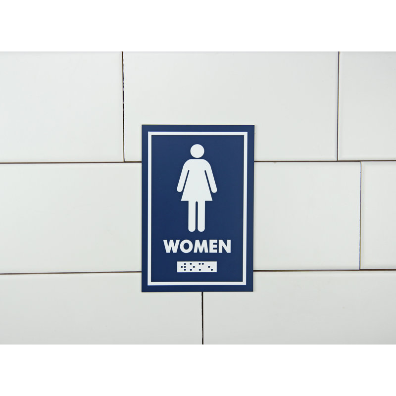 Le symbole féminin est fourni avec un relief braille
