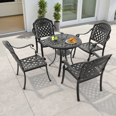 Ancrum 4 - Person Patio Dining Set with Round Table , Red Cushions Included