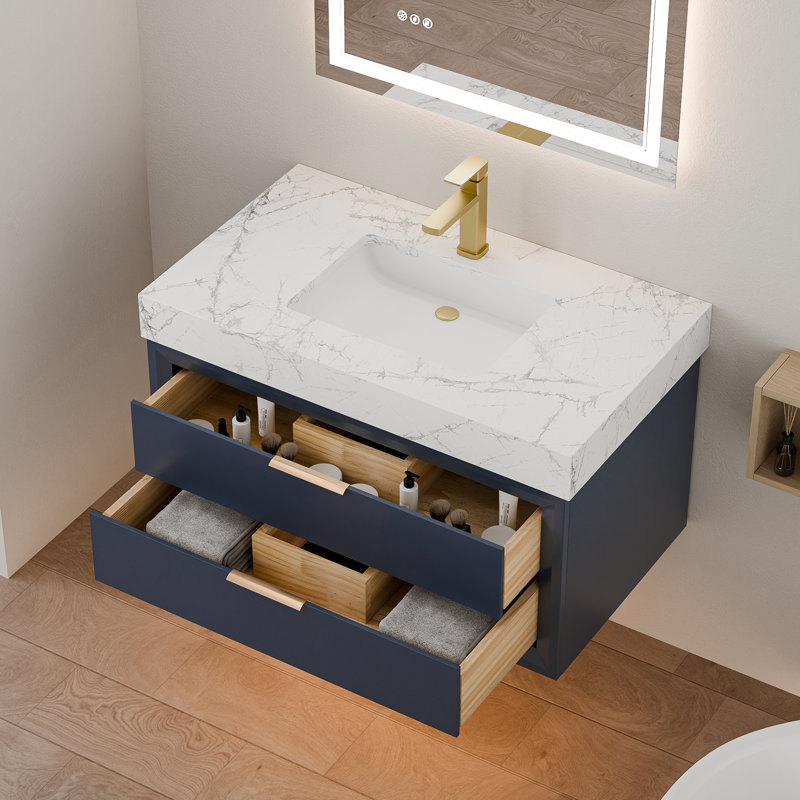 Meuble-lavabo suspendu bleu de 91 cm (36 po) avec éclairage DEL, comptoir en marbre reconstitué, lavabo encastré et tiroirs à fermeture amortie.