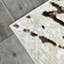 Tapis de luxe Shifra beige et gris avec motif abstrait bronze-750777975