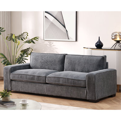 Canapé luxueux en velours côtelé de luxe avec un design élégant, spacieux et confortable pour un salon moderne, idéal pour le divertissement et les moments de détente, grand, gris
