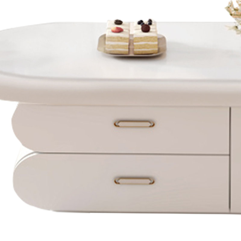 A small cream-colored coffee table