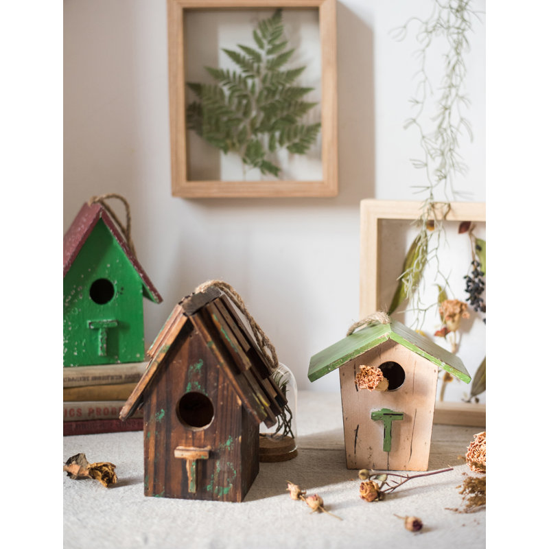 Figurine suspendue maison d’oiseaux en bois